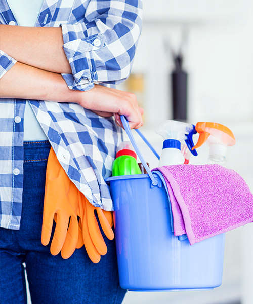 Cleaner wiping down a surface